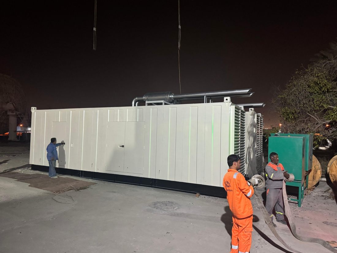 Generator enclosure positioned at site